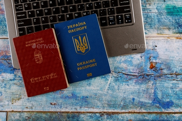 The Hungarian Passports And Ukrainian Passport With Computer Keyboard 